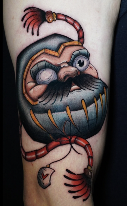 Daruma neo-tradicional en brazo